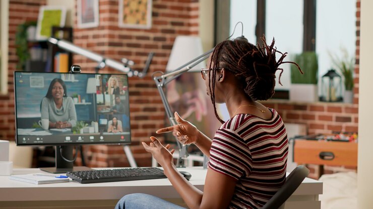 company-employee-attending-videocall-business-meeting-computer-with-webcam-talking-colleagues-about-remote-work-using-online-videoconference-remote-teleconference-call-chat_482257-48652